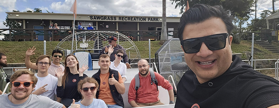 Ravi and some attendee's doing the Everglades Tour